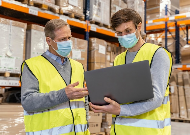 Men in warehouse working