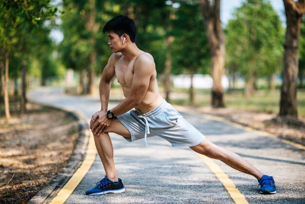 Men warm up before and after exercising