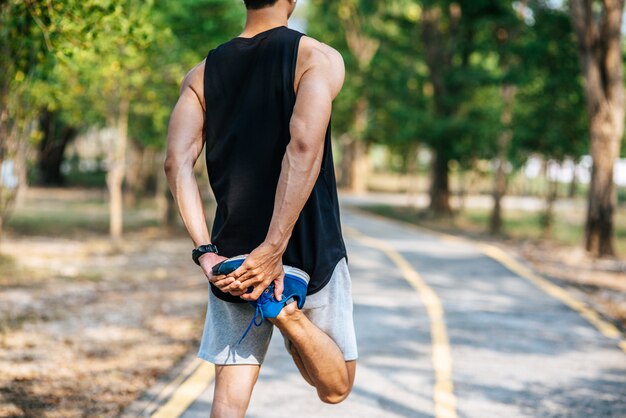 Men warm up before and after exercising