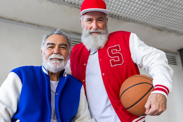 Men wearing varsity jacket