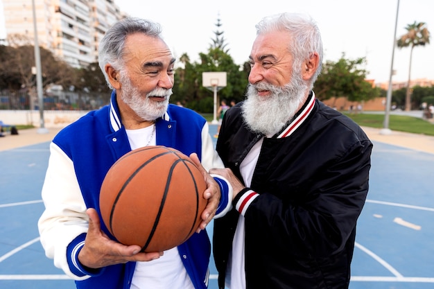 Free photo men wearing varsity jacket