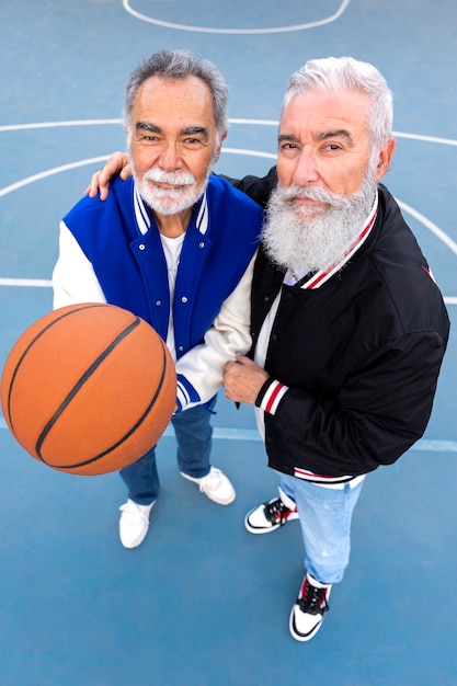 Free photo men wearing varsity jacket