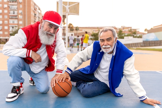 Free photo men wearing varsity jacket