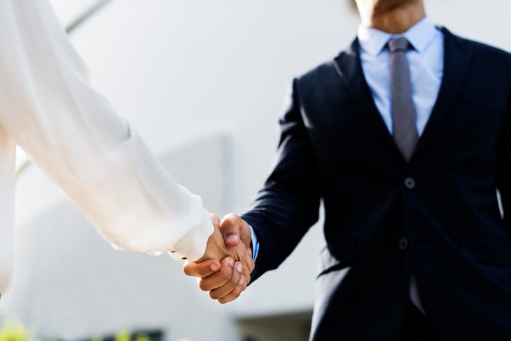 Free Photo men women business agreement hands shake