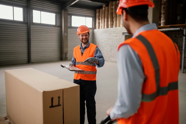 Men working with heavy objects