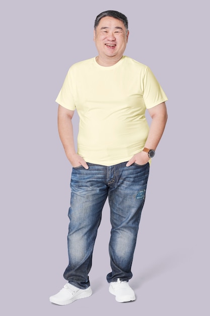 Free photo men in yellow t-shirt and jeans plus size fashion full body