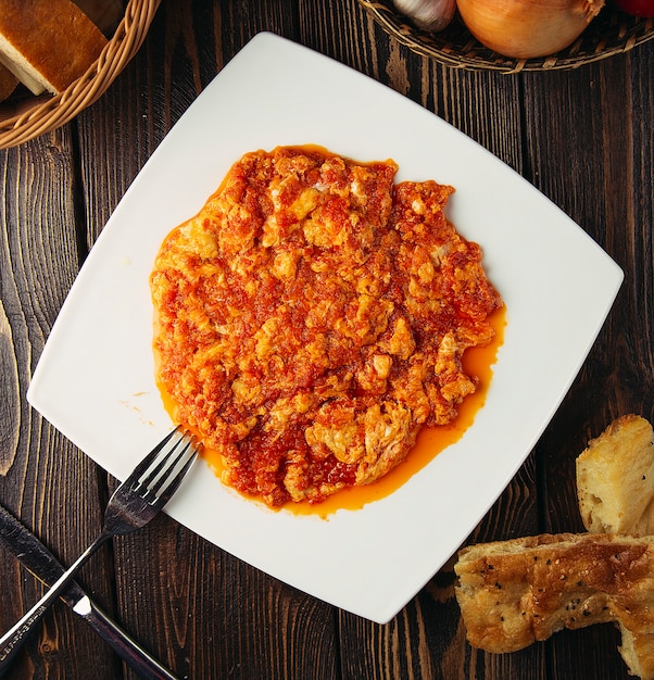 Menemen, turkish breakfast omlette with onion and tomatoes   