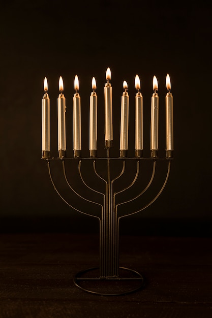 Menorah with golden burning candles