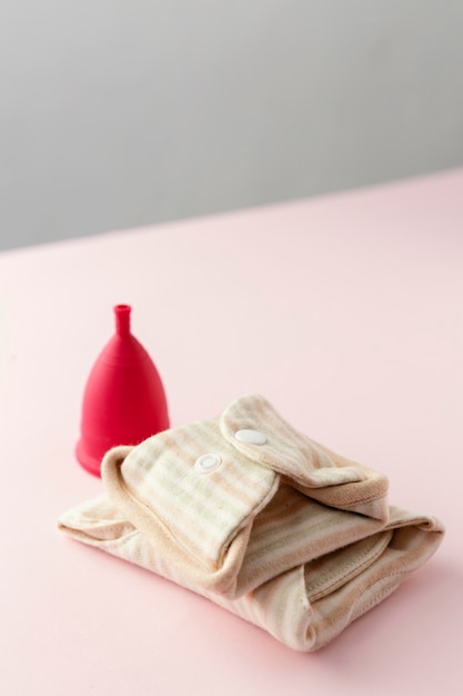 Free photo menstruation cup on desk