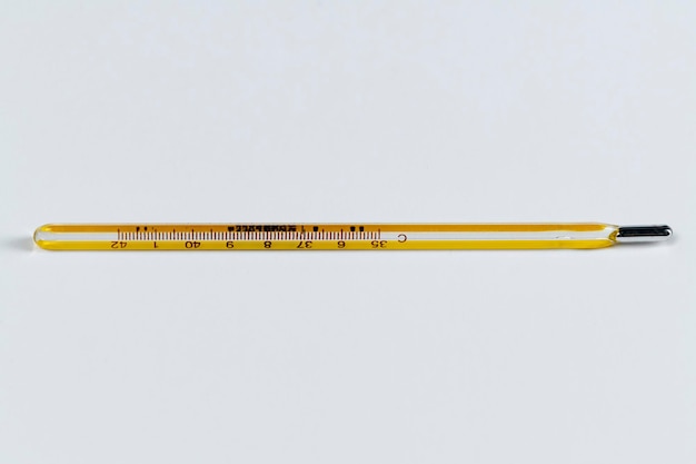Mercury thermometer on a white background
