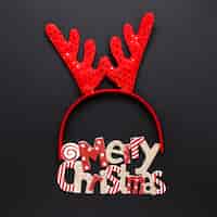 Free photo merry christmas concept with reindeer headband