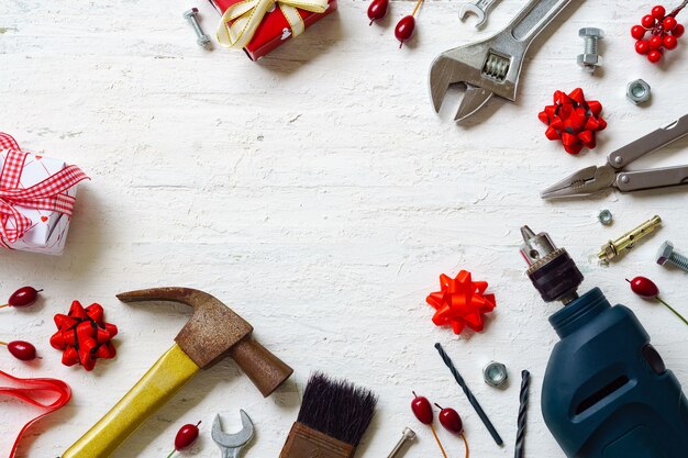 Merry Christmas And Happy New Year With Handy Tools Background Concept Premium Photo
