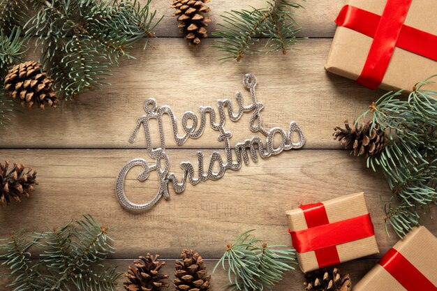 Free Photo merry christmas sign with gifts