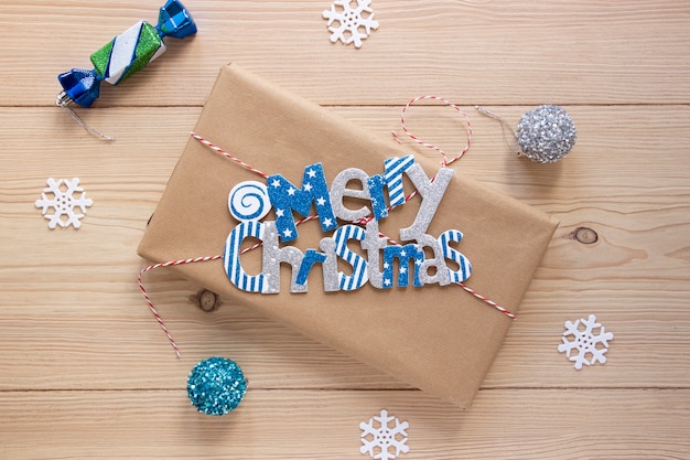 Merry christmas with decorations on wooden background