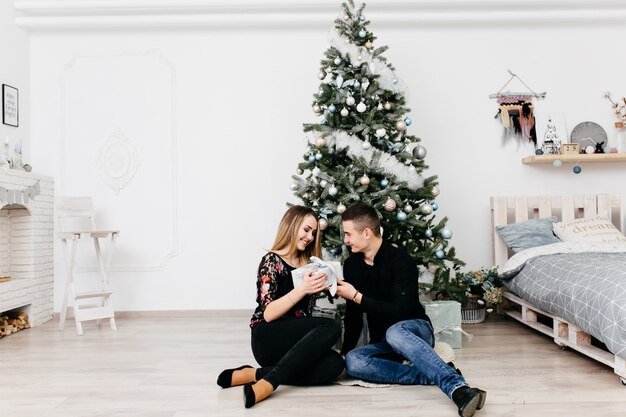 Merry Christmas. Young couple celebrating Christmas 