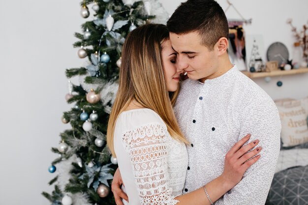 Merry Christmas. Young couple celebrating Christmas 