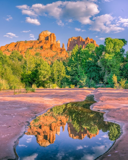 Mesmerizing scenery of cathedral rock with reflection on a water puddle in sedona, usa