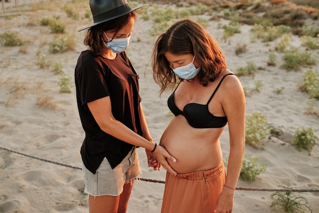 Mesmerizing shot of a lovely pregnant couple