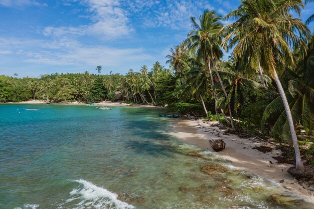 Mesmerizing view of the coastline with white sand and turquoise clear water in Indonesia