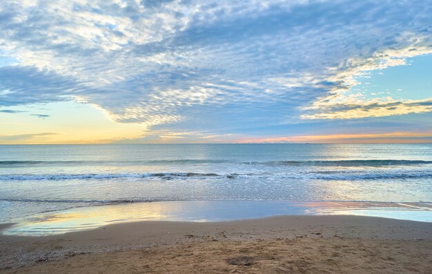 Mesmerizing view of the ocean by the sandy coast