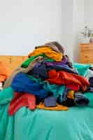 Free photo messy interior full of clothing