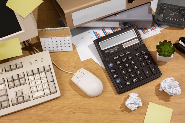 Messy office desk still life