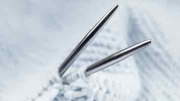 Free photo metal crocheting needles and wool