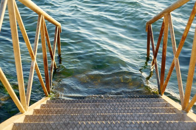 Metal stairs by the sea