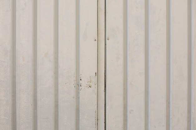 Metal wall with lines and paint