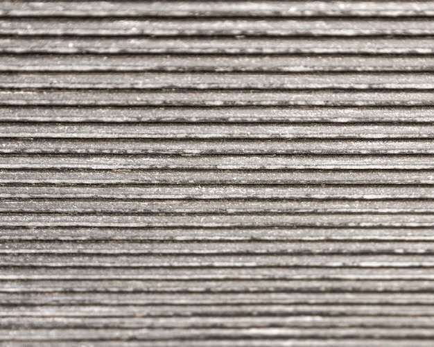 金属の背景の水平方向の灰色の線