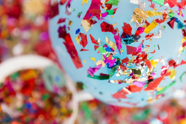 Free photo metallic confetti on balloon