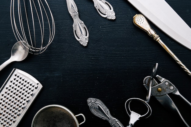 Metallic cooking equipment on kitchen counter