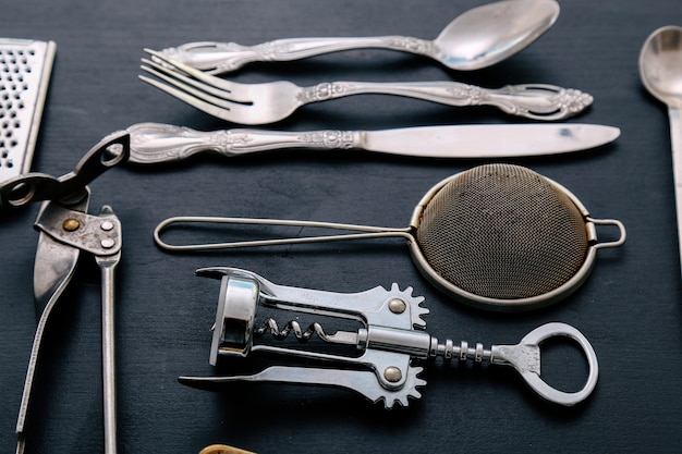 Metallic cooking equipment on kitchen counter