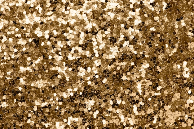 Free photo metallic gold glitter background