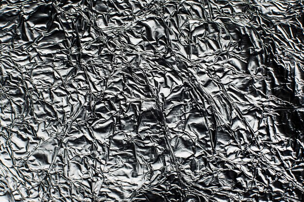 Aluminum foil texture. Glide view. Gold Stock Photo by ©gf2002.mail.ru  147767977