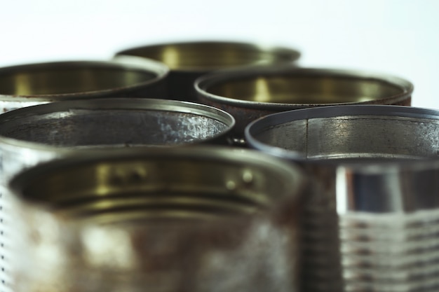 Metallic jars on white