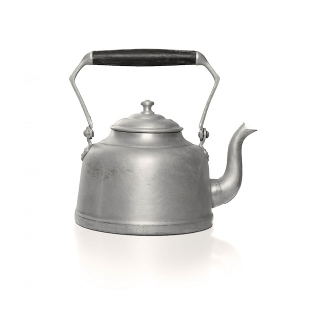 Free photo metallic teapot with black handle