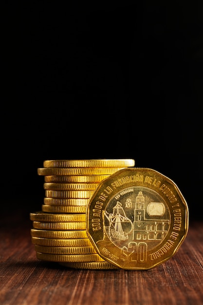 Mexican coins arrangement on table