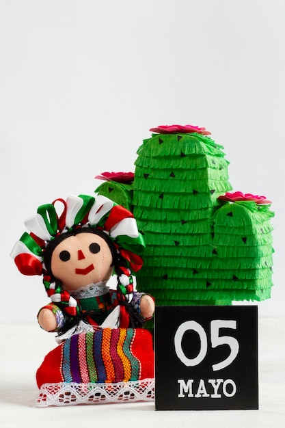 Free photo mexican doll and pinata arrangement