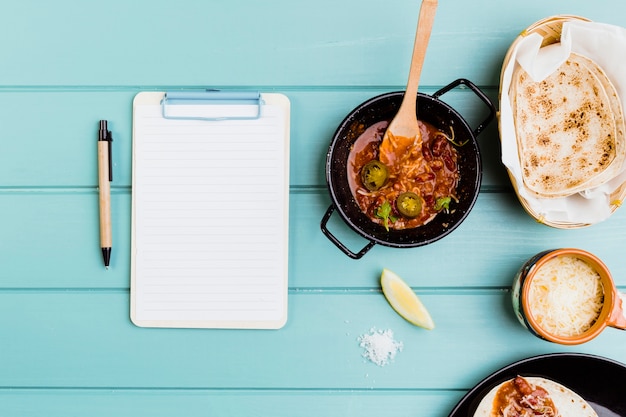 Mexican food concept with clipboard