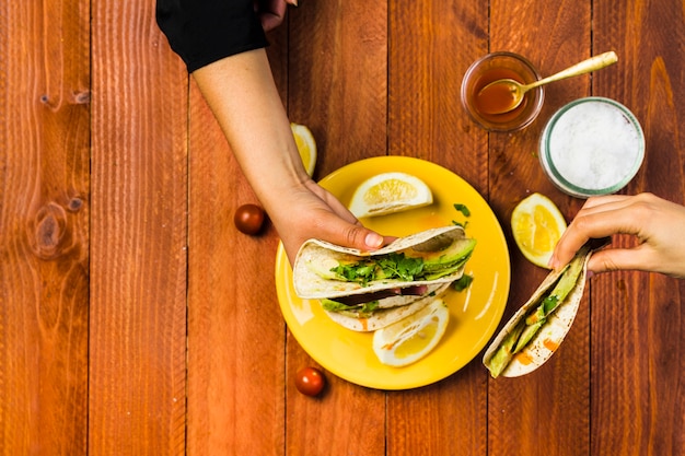 Mexican food concept with tacos on plate