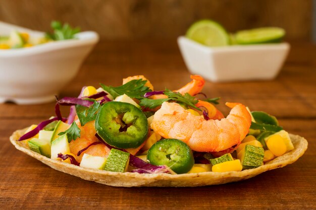 Mexican food concept on wooden background