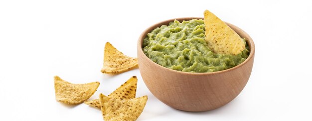 Mexican guacamole with nacho chip isolated on white background Copy space