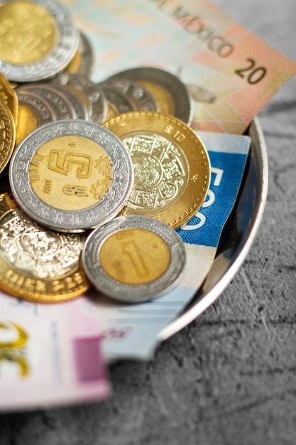 Mexican pesos arrangement still life in bowl