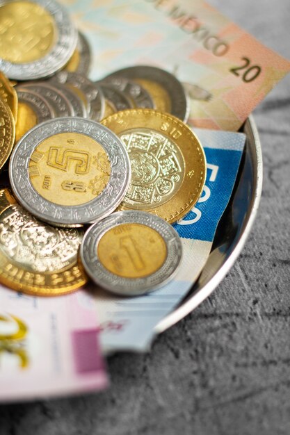 Mexican pesos arrangement still life in bowl