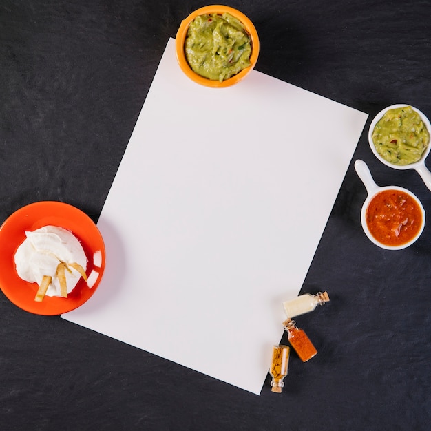 Free photo mexican sauces near paper sheet