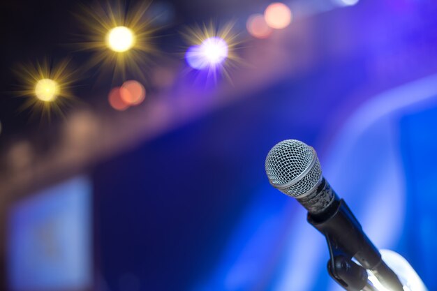 Blurred of microphones in seminar room, talking speech in ...