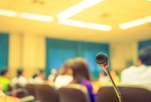 Microphone with background people out of focus