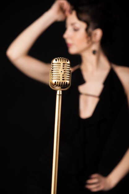 Microphone with blur woman