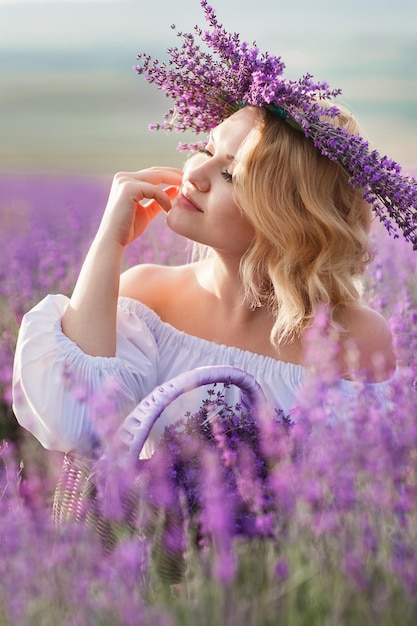 Free photo mid age woman in lavender field